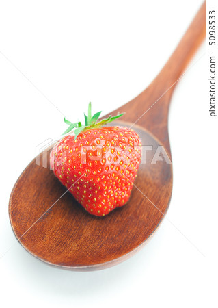 wooden spoon and strawberry isolated on white 5098533