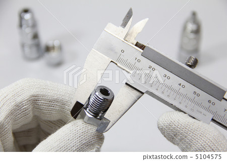 Quality control of parts using calipers Measurement inspection image 5104575