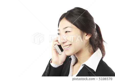 A woman operating a smartphone 5106570