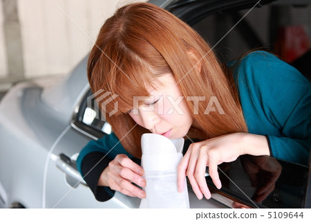 A woman getting intoxicated by a car A woman getting intoxicated by a car 5109644
