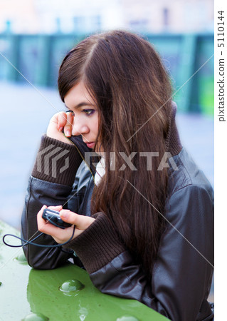 Girl listening music Girl listening music 5110144