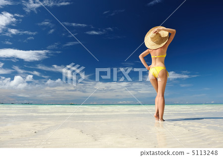 Girl on a beach Girl on a beach 5113248