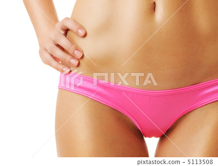 Sexy tan woman in bikini close-up 5113508
