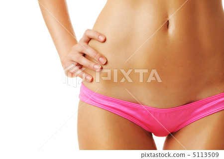 Sexy tan woman in bikini close-up 5113509