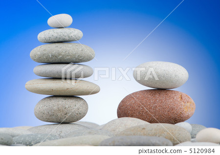 Pebbles stack against gradient background Pebbles stack against gradient background 5120984