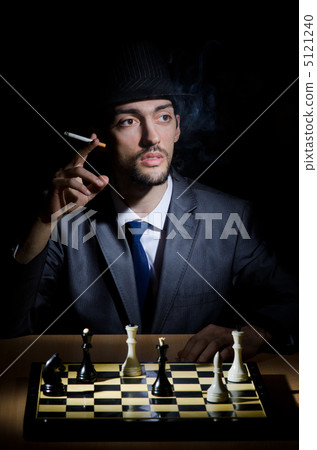 Chess player playing his game 5121240