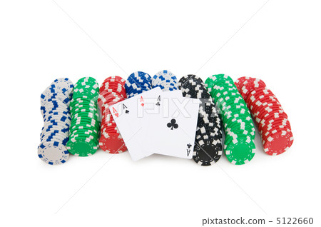 Casino chips and cards isolated on the white 5122660