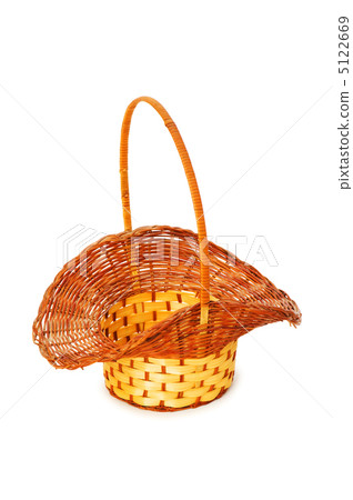 Woven basket isolated on the white background Woven basket isolated on the white background 5122669