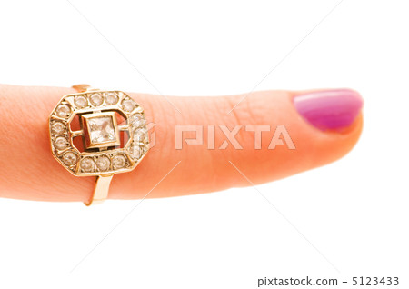 Finger with golden ring isolated on the white Finger with golden ring isolated on the white 5123433
