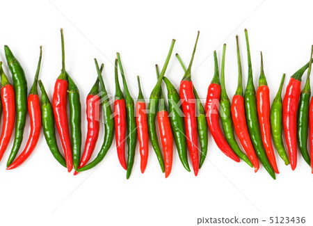 Red and green peppers isolated on white Red and green peppers isolated on white 5123436