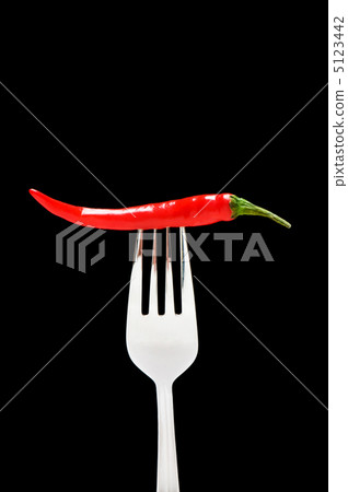 Red pepper isolated on the black background Red pepper isolated on the black background 5123442