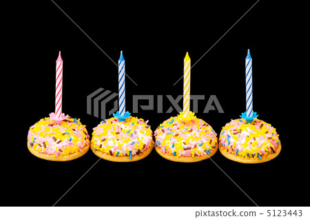 Cupcakes and candles isolated on the white background 5123443