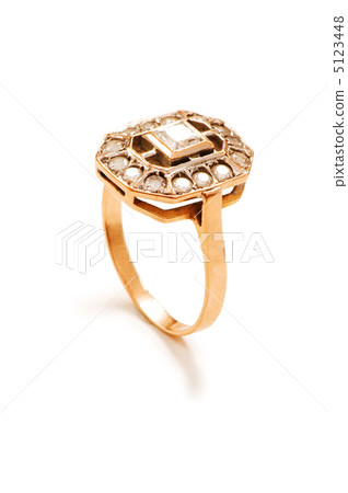 Golden ring isolated on the white background Golden ring isolated on the white background 5123448