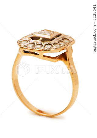 Golden ring isolated on the white background Golden ring isolated on the white background 5123541