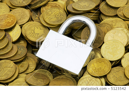 Concept of financial security with lock and coins Concept of financial security with lock and coins 5123542