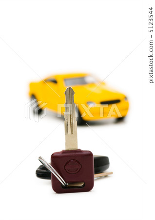 Car keys and car at background isolated on white Car keys and car at background isolated on white 5123544