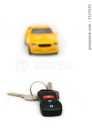 Car keys and car at background isolated on white Car keys and car at background isolated on white 5123545