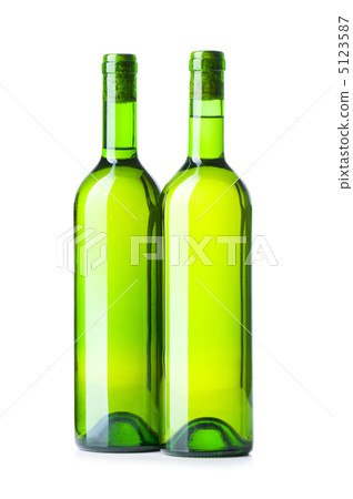 Wine bottles isolated on the white 5123587