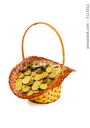 Basket full of coins isolated on white Basket full of coins isolated on white 5123812