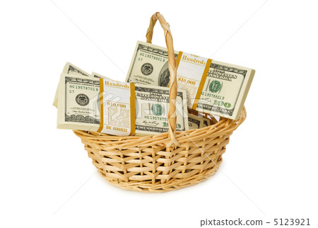 Basket full of dollars isolated on white Basket full of dollars isolated on white 5123921