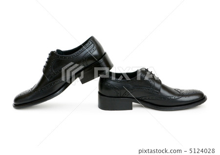 Black shoes isolated on the white background Black shoes isolated on the white background 5124028