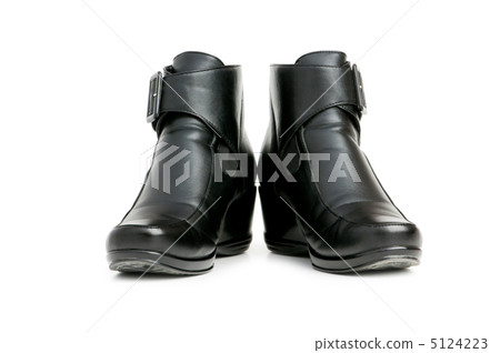 Black boots isolated on the white background Black boots isolated on the white background 5124223