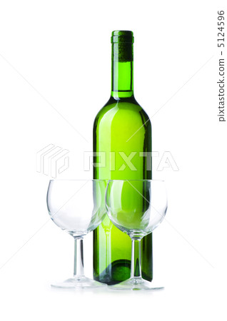 Bottle and glass isolated on the white 5124596