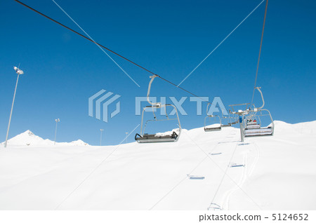 Ski lift chairs on bright winter day Ski lift chairs on bright winter day 5124652