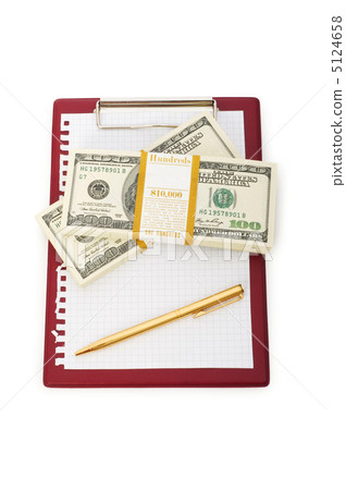 Stack of dollars and blank pad isolated Stack of dollars and blank pad isolated 5124658