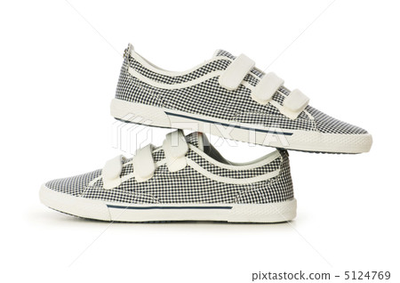 Sporty shoes isolated on the white background 5124769