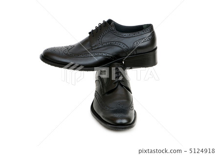 Black shoes isolated on the white background Black shoes isolated on the white background 5124918
