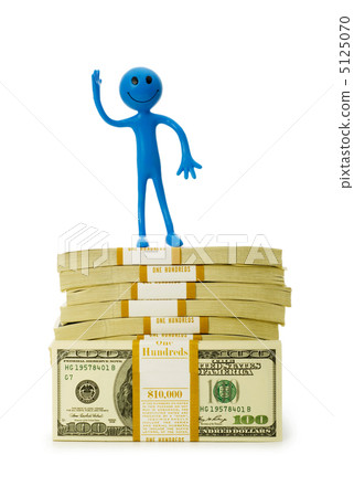 Smilie sitting on top of dollar stack Smilie sitting on top of dollar stack 5125070