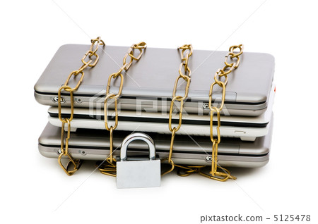 Concept of computer security with laptop and chain 5125478