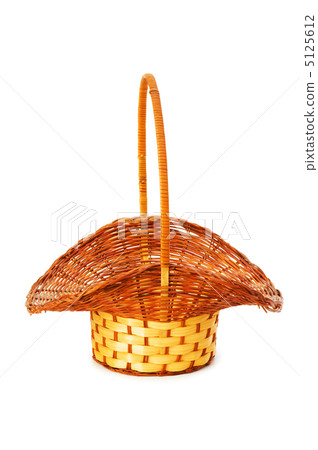 Woven basket isolated on the white background Woven basket isolated on the white background 5125612