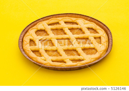 Sweet pie isolated on the yellow background Sweet pie isolated on the yellow background 5126146