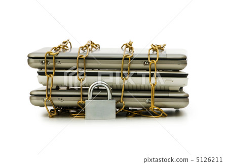 Concept of computer security with laptop and chain 5126211