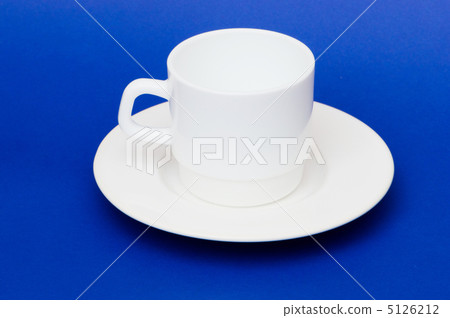 White cup isolated on the colourful background 5126212