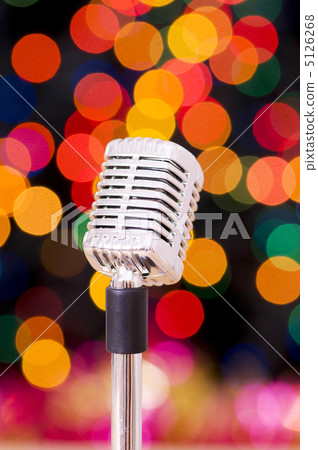 Vintage microphone isolated on the white background 5126268