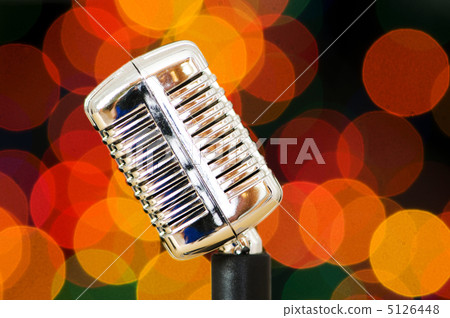 Vintage microphone isolated on the white background 5126448