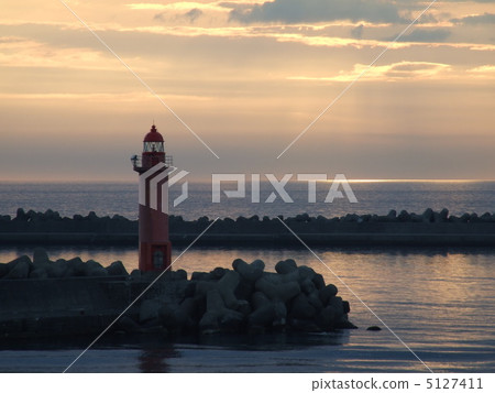 Red lighthouse and sunset 5127411