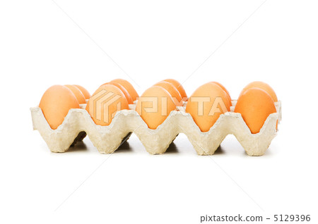 Lots of eggs in the carton isolated on white 5129396