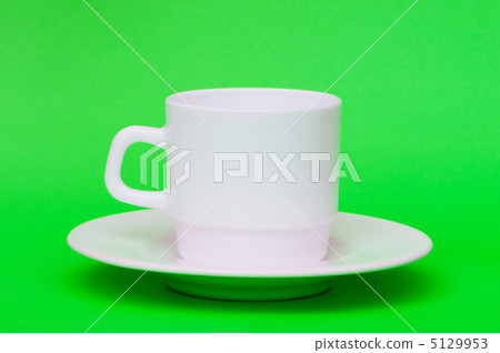 White cup isolated on the colourful background 5129953