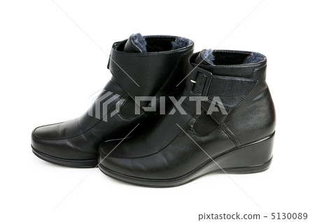 Black boots isolated on the white background 5130089