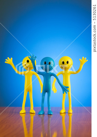 Leadership concept with smilies against gradient background Leadership concept with smilies against gradient background 5130261