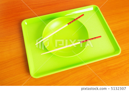 Asian food concept with plate and chopsticks Asian food concept with plate and chopsticks 5132307