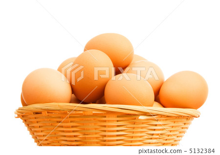 Brown eggs in the basket on white Brown eggs in the basket on white 5132384