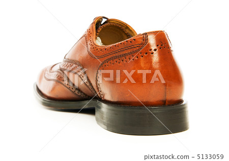 Male shoes isolated on the white background Male shoes isolated on the white background 5133059