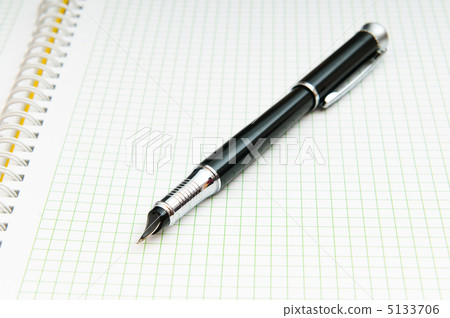 Writing pen on the blank page 5133706