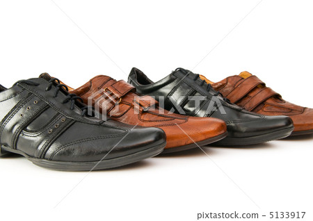 Male shoes isolated on the white background Male shoes isolated on the white background 5133917