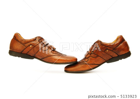 Male shoes isolated on the white background Male shoes isolated on the white background 5133923